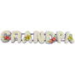 A long, horizontal floral arrangement in the shape of the word "GRANDPA" dominates the image, every letter made entirely from fresh flowers arranged with care. The letters are bold and upright, evenly spaced across a clean white background, giving the tribute a sense of clarity and presence that would stand out at a funeral or memorial service in Mile End or the surrounding East London neighbourhoods. Each capital letter is filled with tightly packed white chrysanthemums, the many small petals overlapping into a soft, cushion-like surface that suggests purity, peace, and a gentle goodbye. Peeking out just beneath the flower heads is a subtle edging of pale lilac or lavender ribbon, running along the base of each letter and providing a calm wash of colour that frames the word without competing with it. Discreet dark green bars run behind the design, supporting and linking the letters so they form one continuous tribute. To break the expanse of white, four letters carry colour-rich floral sprays. The "G" and the "D" are decorated with striking red anthuriums, their glossy, heart-shaped blooms and central yellow spadices surrounded by deep green foliage, symbolising strong love and respect. The first and last "A" are softened by clusters of yellow-green orchids, their delicate, arching petals and speckled centres adding a refined, almost serene beauty, again nestled into fresh greenery. The whole tribute feels quiet yet expressive, as if it were created by an experienced local florist who understands how families in Mile End want to say farewell to a cherished grandfather-with dignity, tenderness, and a message written clearly in flowers.